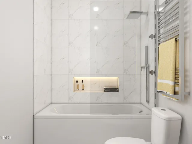 a bathroom with a sink a toilet and a bathtub