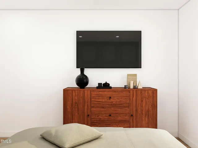 a view of bedroom with a dresser