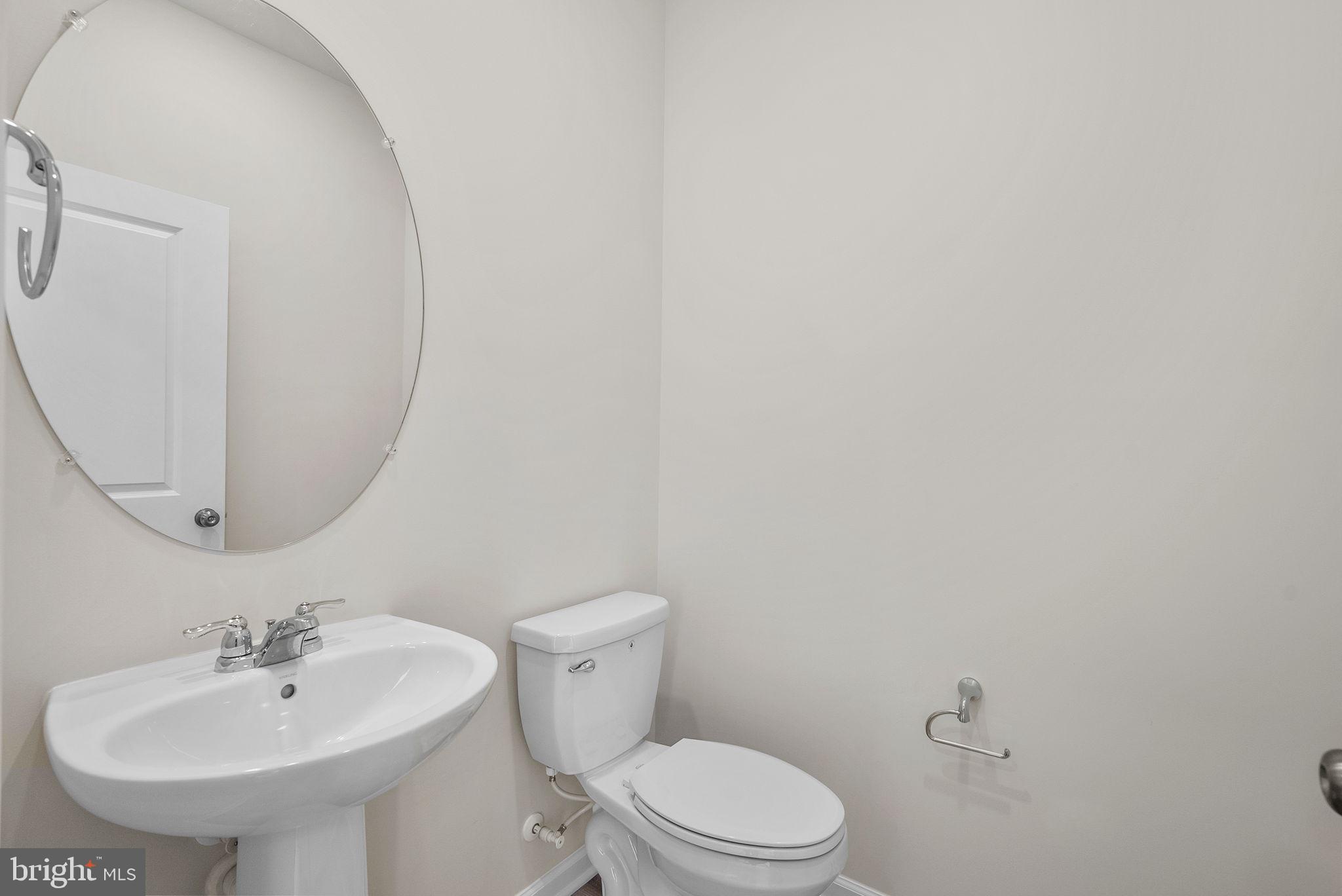 124 Canning Road Inwood, WV 25428 - Photo 10 of 22 Powder bath on main level