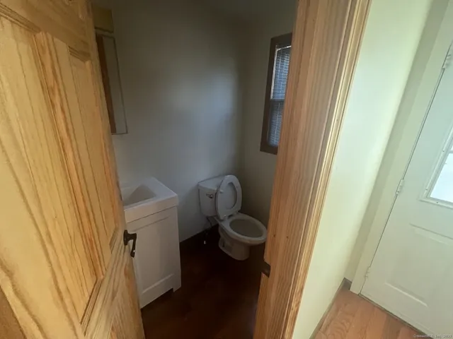 a bathroom with a sink and toilet