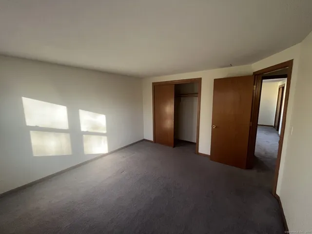 a view of empty room with windows