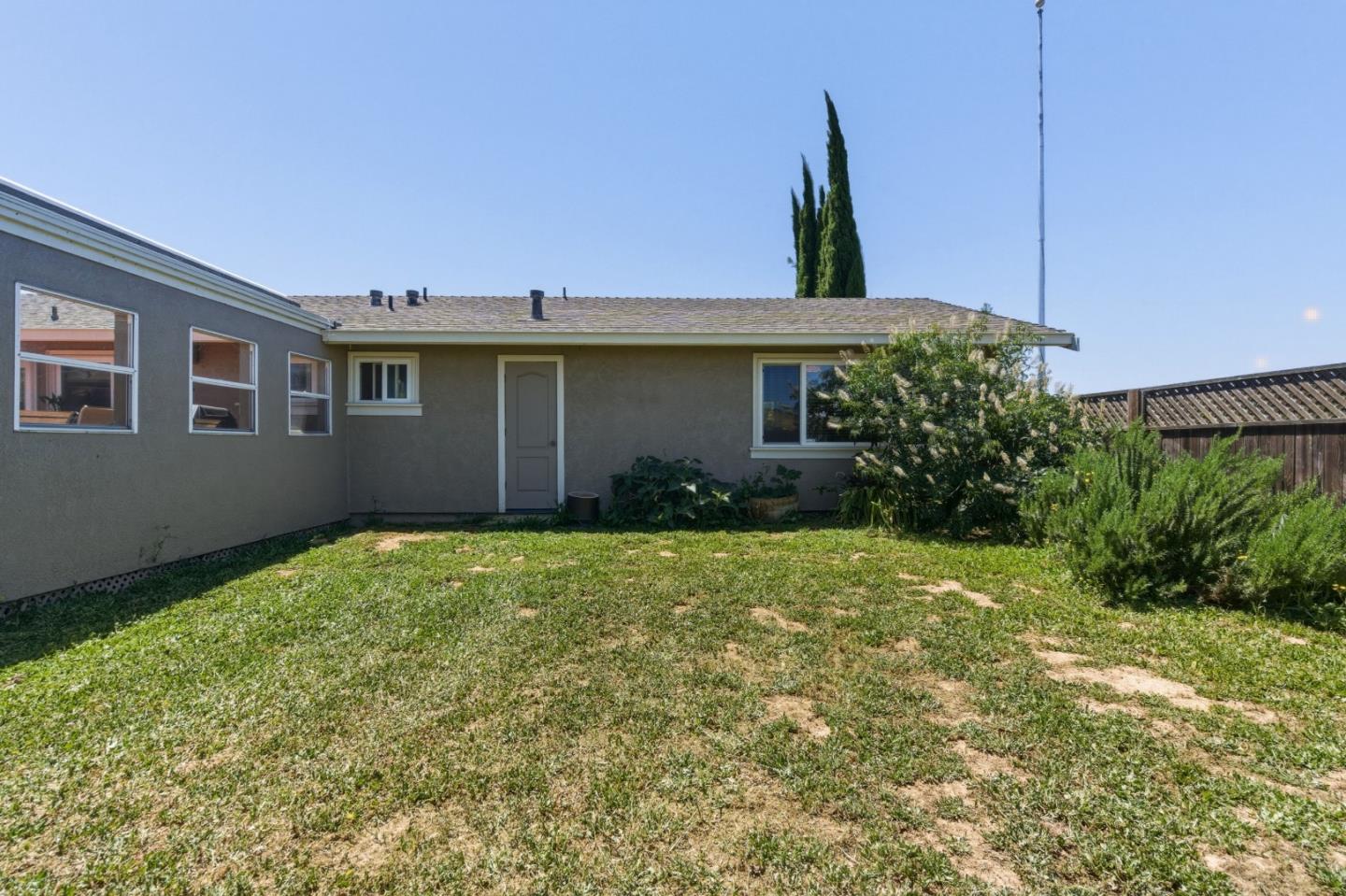 38780 Dinosaur Point Road Hollister, CA 95023 - Photo 14 of 34 a view of a house with backyard and garden