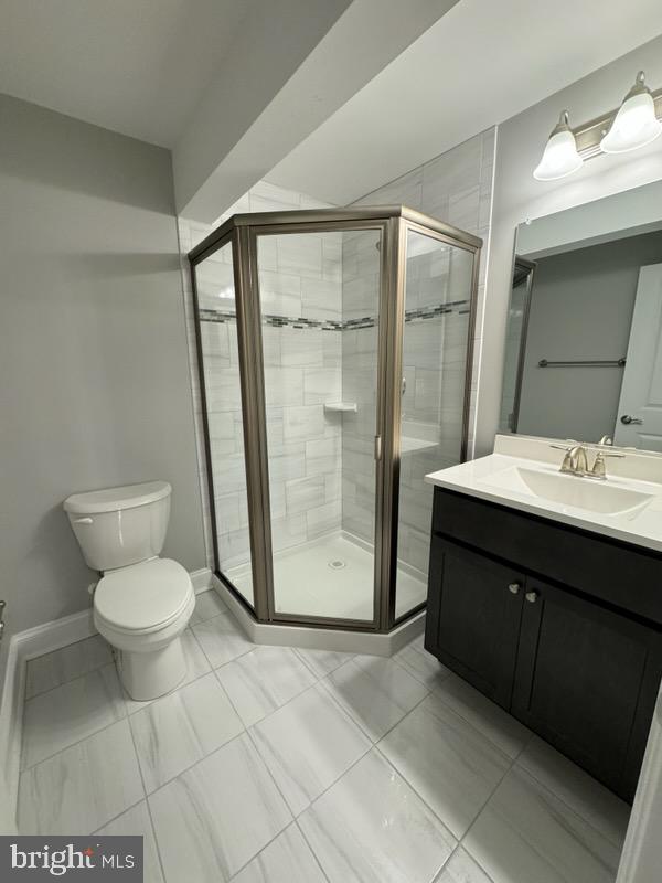 1103 Llano Drive, Unit B La Plata, MD 20646 - Photo 13 of 13 a bathroom with a sink toilet and shower