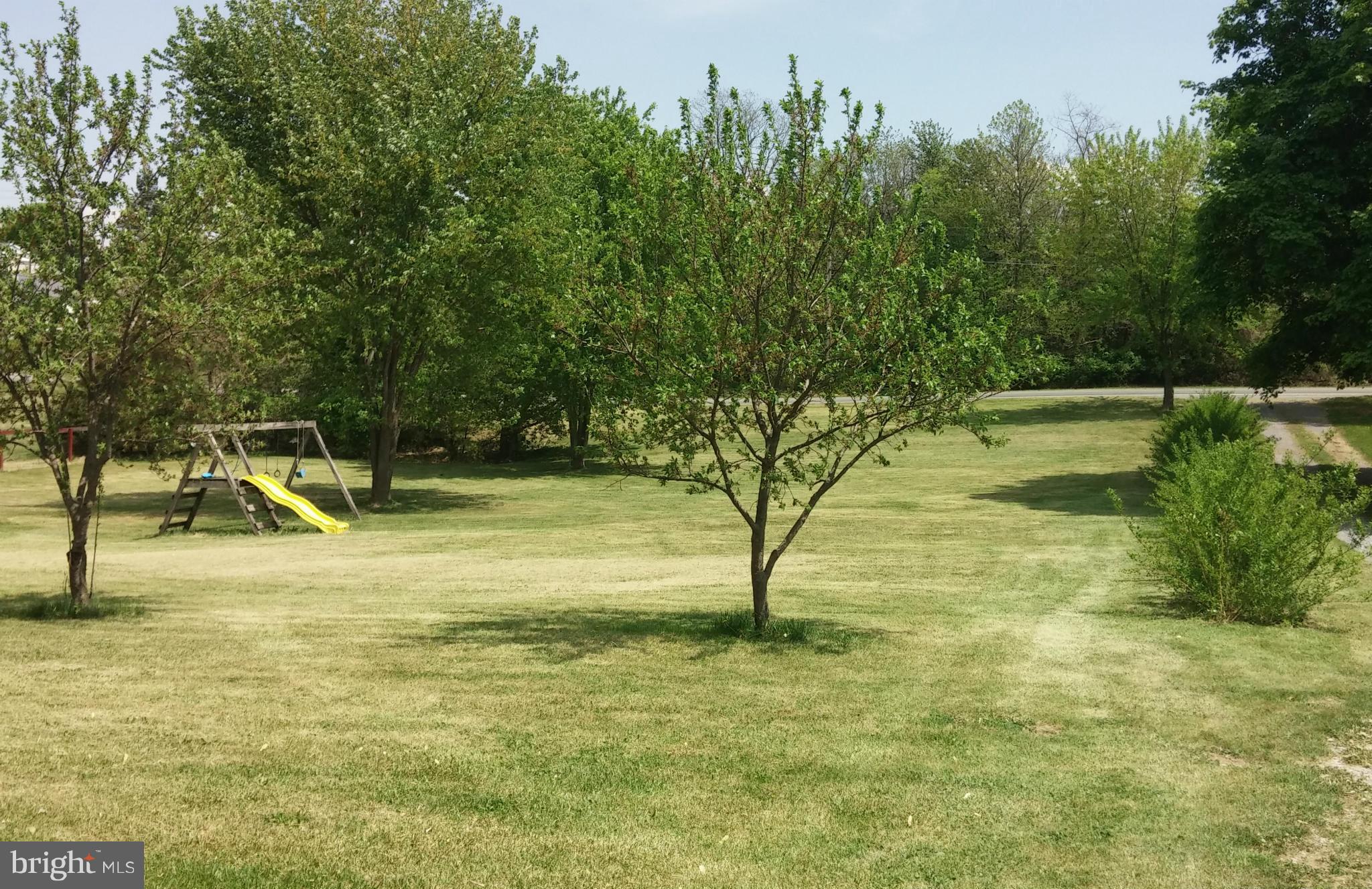 14807 Bottom Road Williamsport, MD 21795 - Photo 2 of 30 a view of a swimming pool with a yard