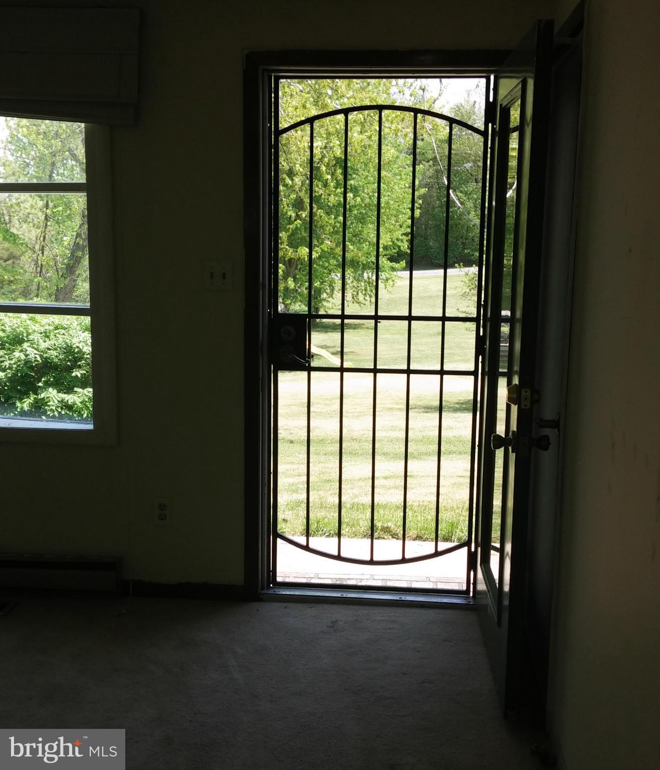 14807 Bottom Road Williamsport, MD 21795 - Photo 14 of 30 a view of an empty room with a large window