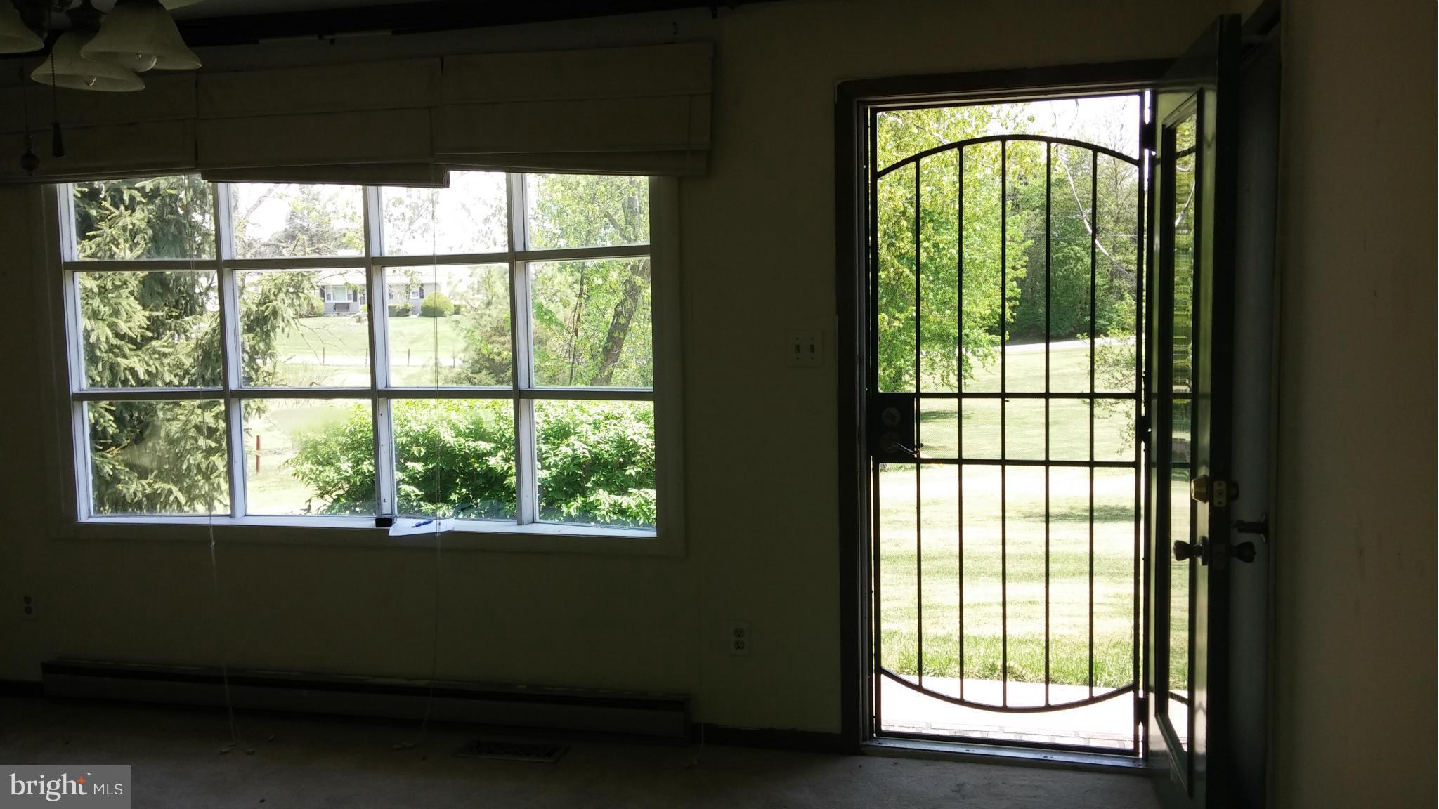 14807 Bottom Road Williamsport, MD 21795 - Photo 15 of 30 a view of an entryway with a floor to ceiling window