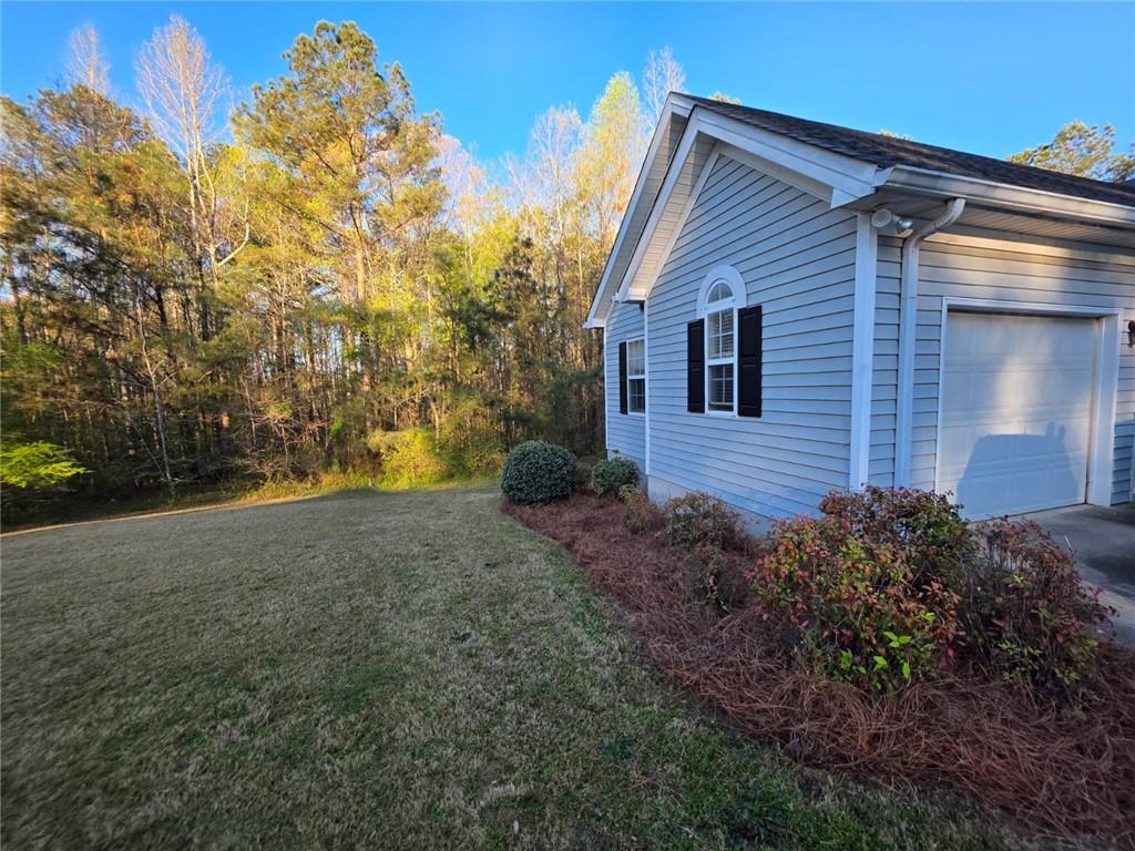 7387 Milam Road Winston, GA 30187 - Photo 7 of 41 a view of a house with a yard