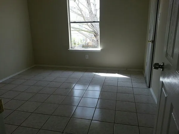an empty room with white door