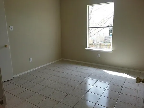 a view of a room and window