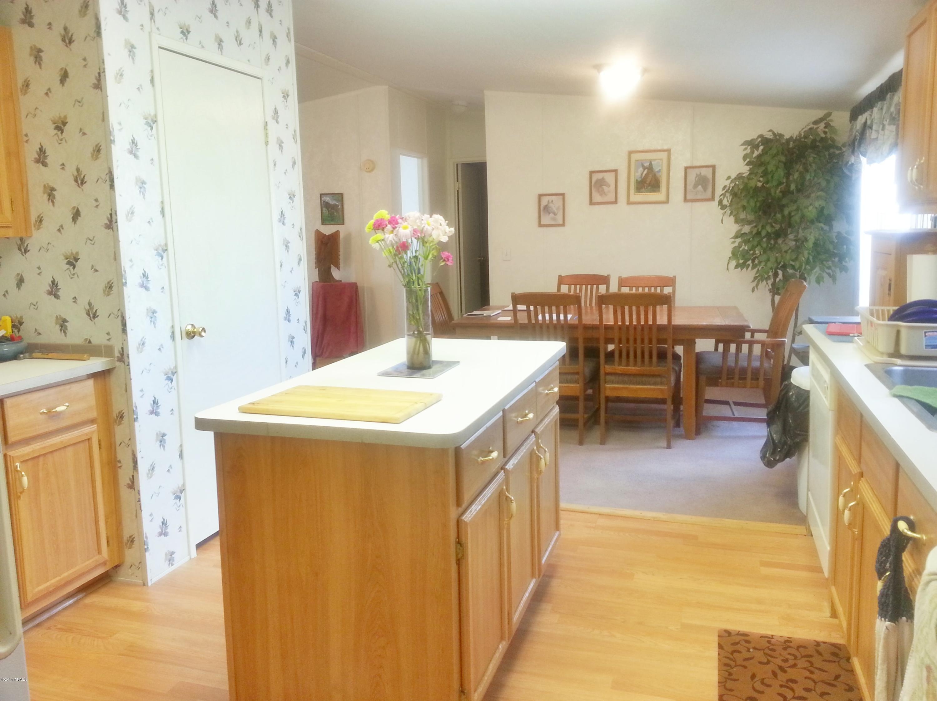 749 North Hilton Road Apache Junction, AZ 85119 - Photo 16 of 25 View of dining room from kitchen