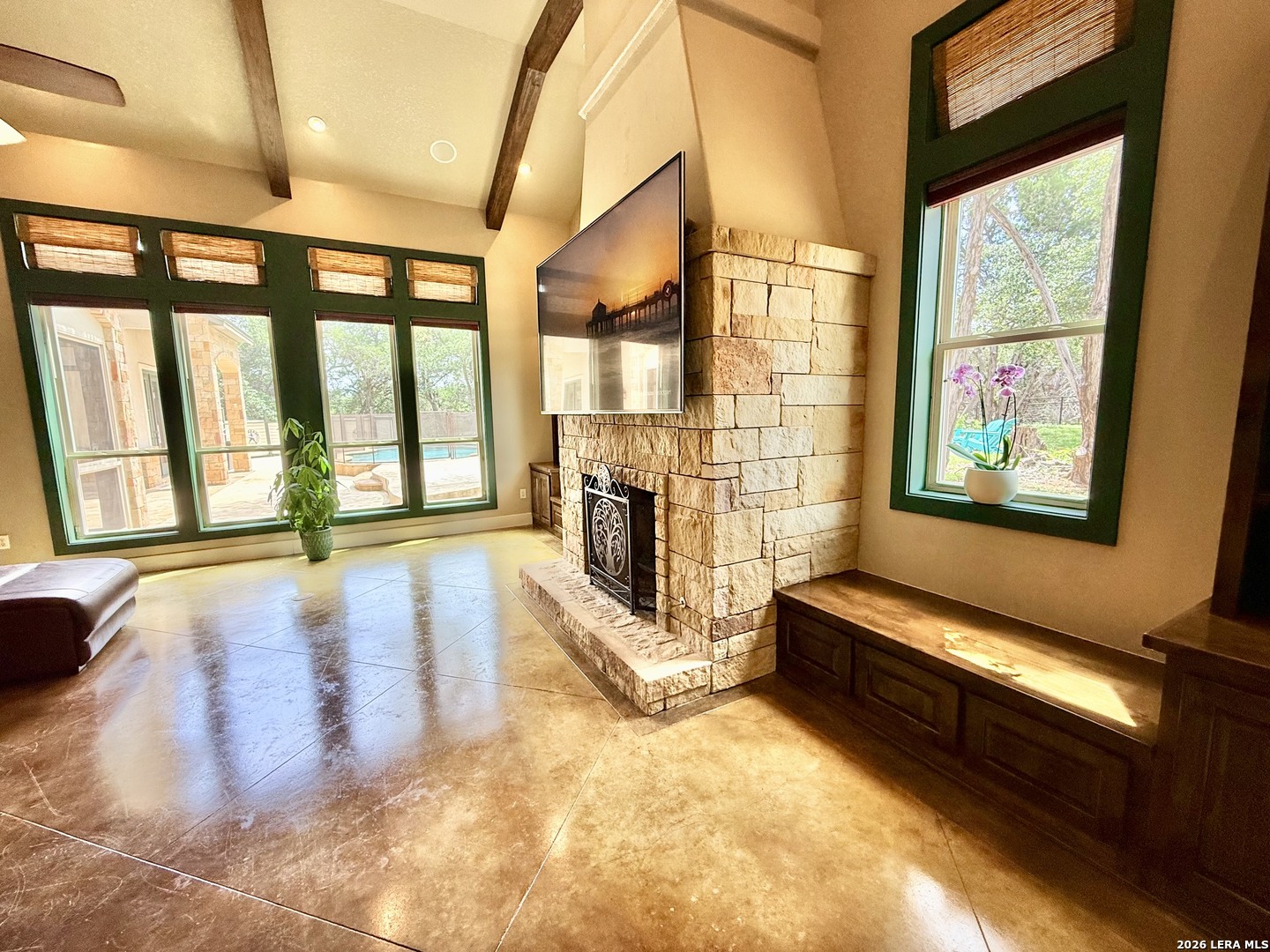757 Copper Rim Spring Branch, TX 78070 - Photo 9 of 50 a view of an empty room with wooden floor and a fireplace