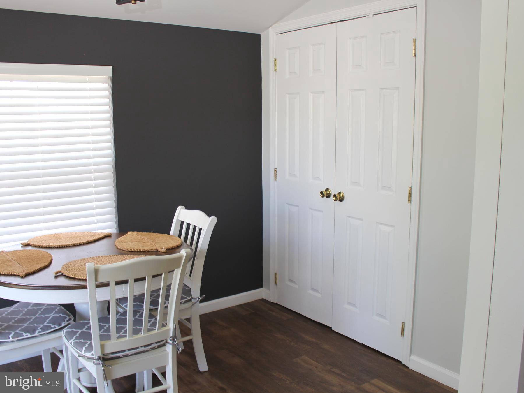1643 Oldtown Road Edgewater, MD 21037 - Photo 5 of 8 a view of a dining room that has a table and chair