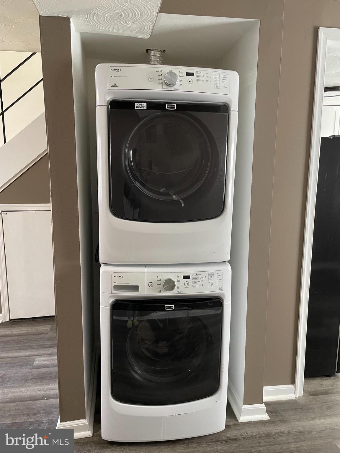 2607 Colebrooke Drive, Unit 21 Temple Hills, MD 20748 - Photo 5 of 9 a close up view of washer and dryer