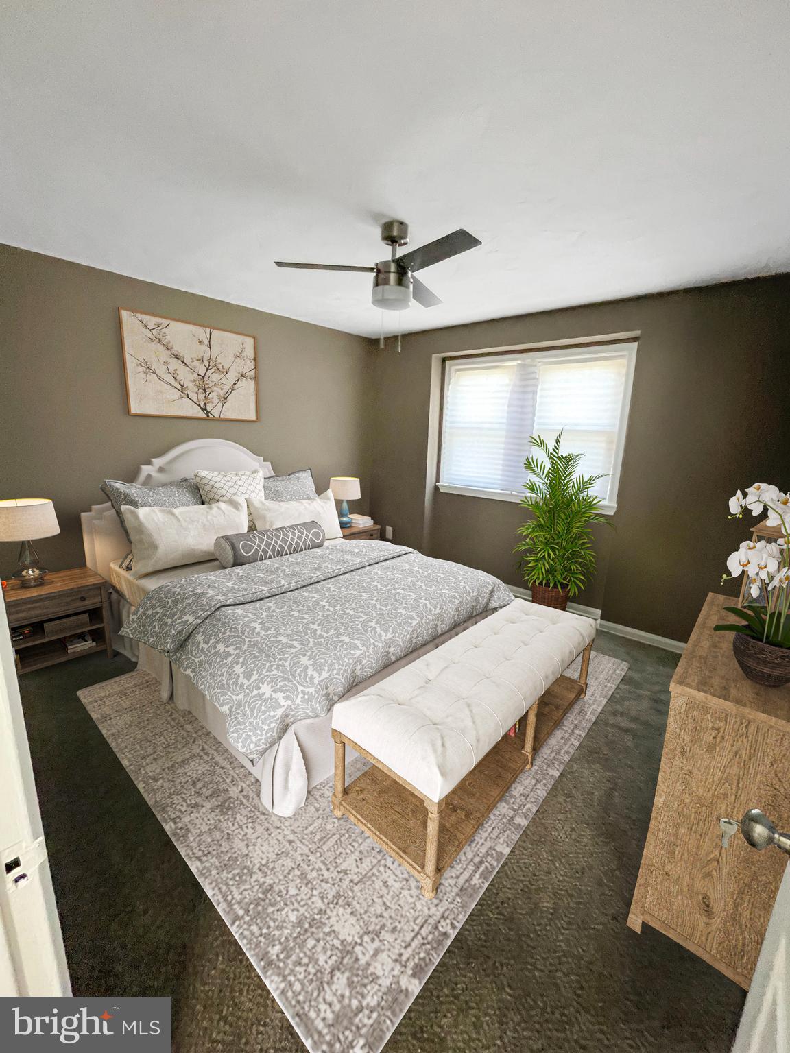 2607 Colebrooke Drive, Unit 21 Temple Hills, MD 20748 - Photo 7 of 9 a bedroom with bed and window