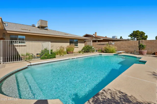 a front view of house with yard and outdoor seating