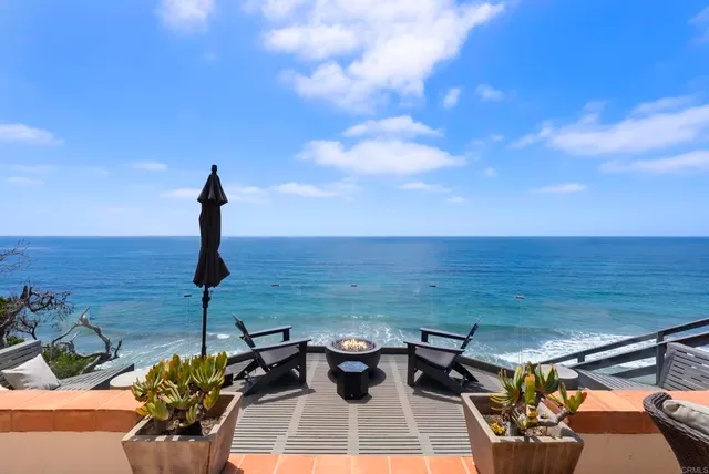 a view of a terrace with furniture