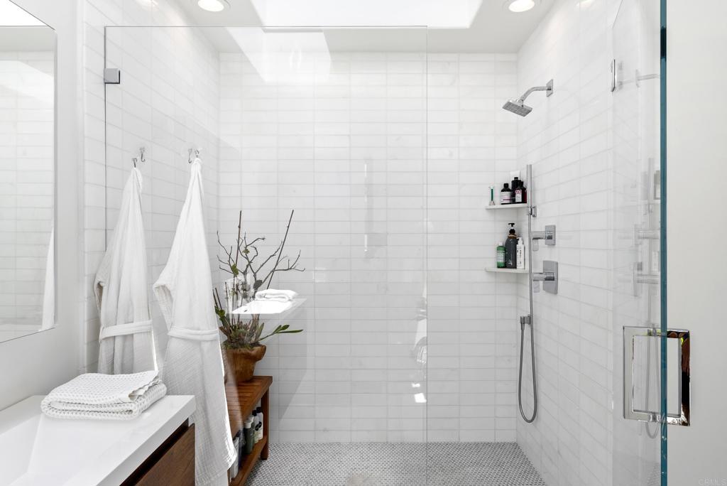 1370 Neptune Avenue Encinitas, CA 92024 - Photo 11 of 31 a bathroom with a sink toilet and shower