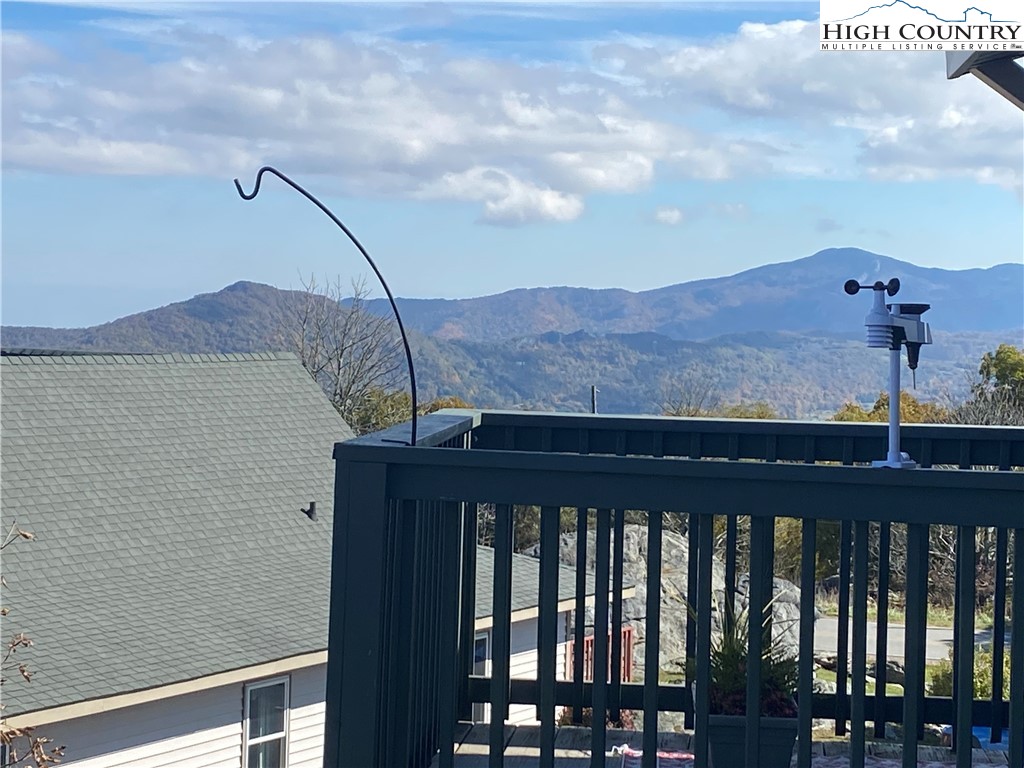 301 Pinnacle Inn Road, Unit 1306 Beech Mountain, NC 28604 - Photo 4 of 19 a view of a balcony with an outdoor space