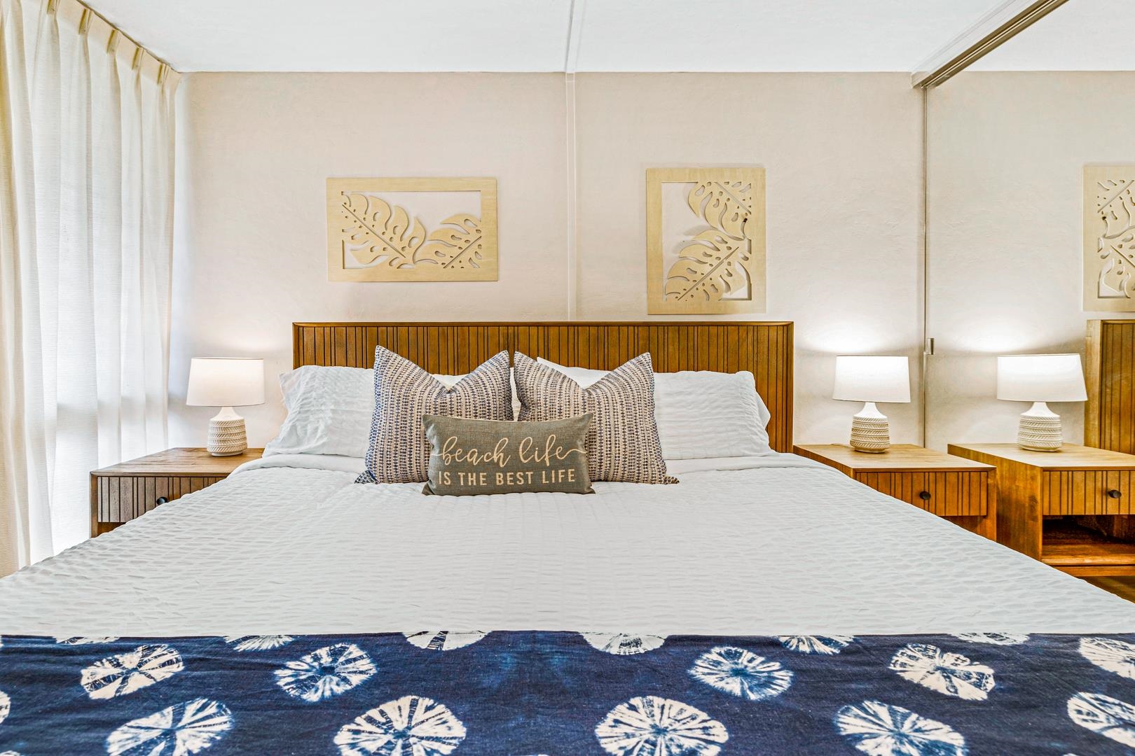 2191 South Kihei Road, Unit 1305 Kihei, HI 96753 - Photo 15 of 21 a large bed sitting in a bedroom and chair next to a window