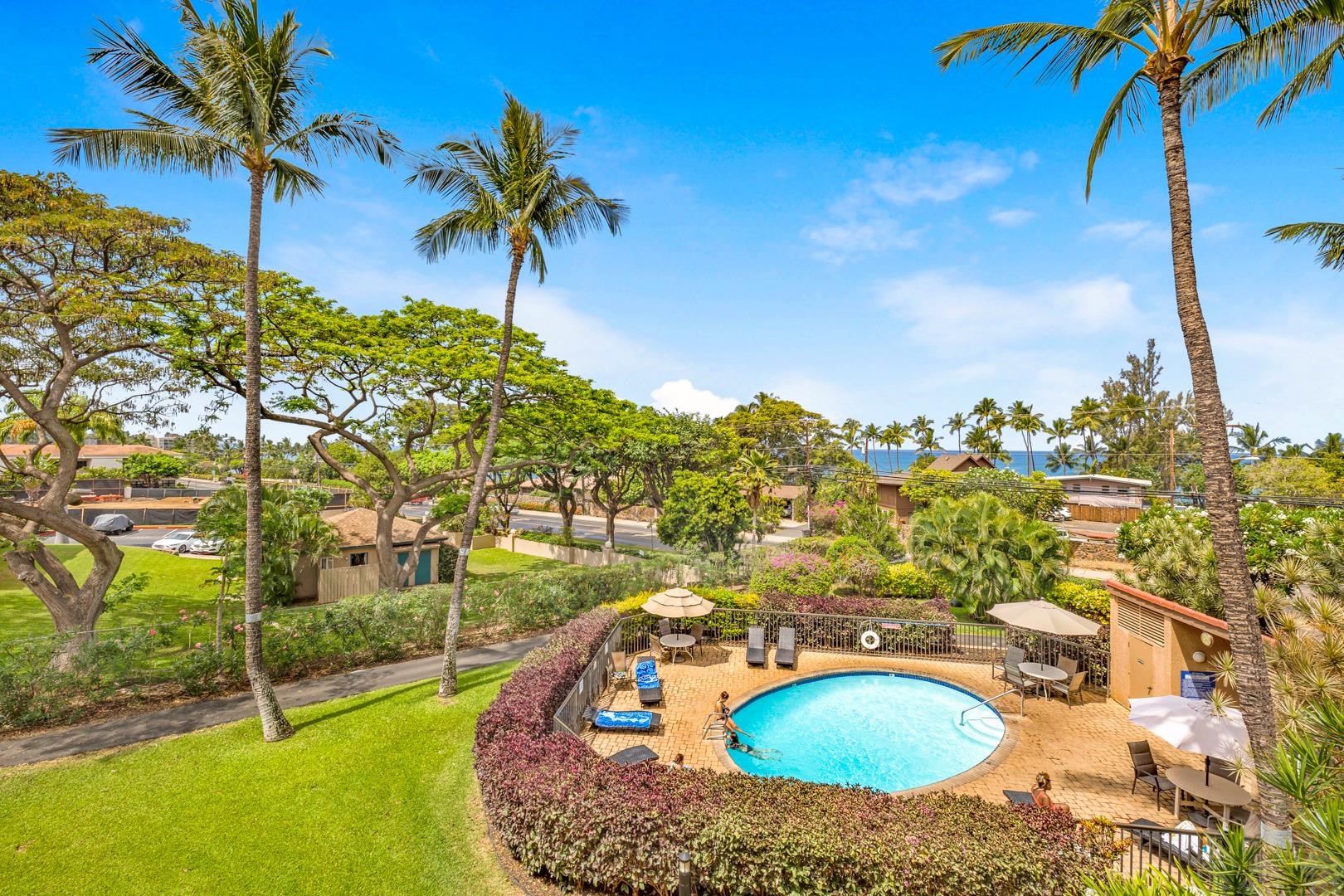 2191 South Kihei Road, Unit 1305 Kihei, HI 96753 - Photo 19 of 21 a view of a swimming pool with a yard
