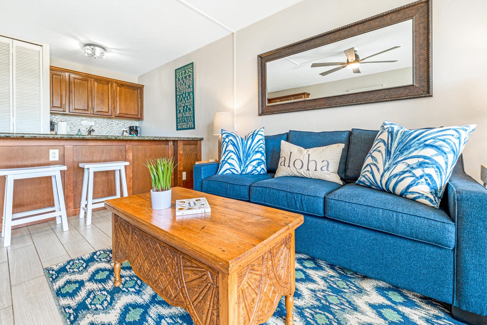 2191 South Kihei Road, Unit 1305 Kihei, HI 96753 - Photo 3 of 21 a living room with stainless steel appliances furniture and rug