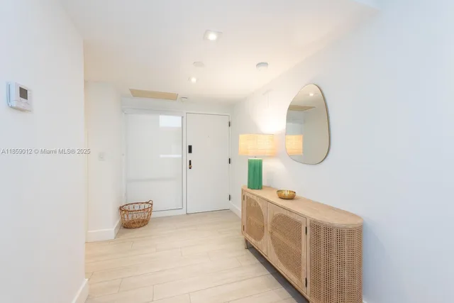 a spacious bathroom with a double vanity sink and a mirror