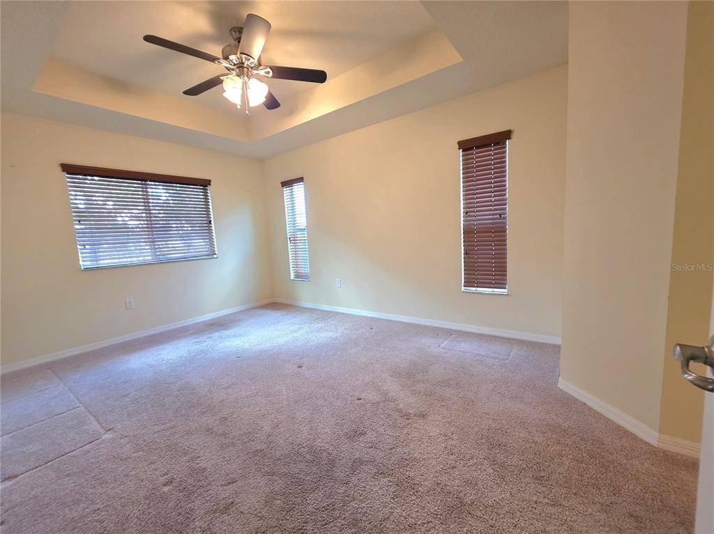4284 High Ridge Avenue Spring Hill, FL 34609 - Photo 20 of 40 a view of a livingroom with a ceiling fan and window