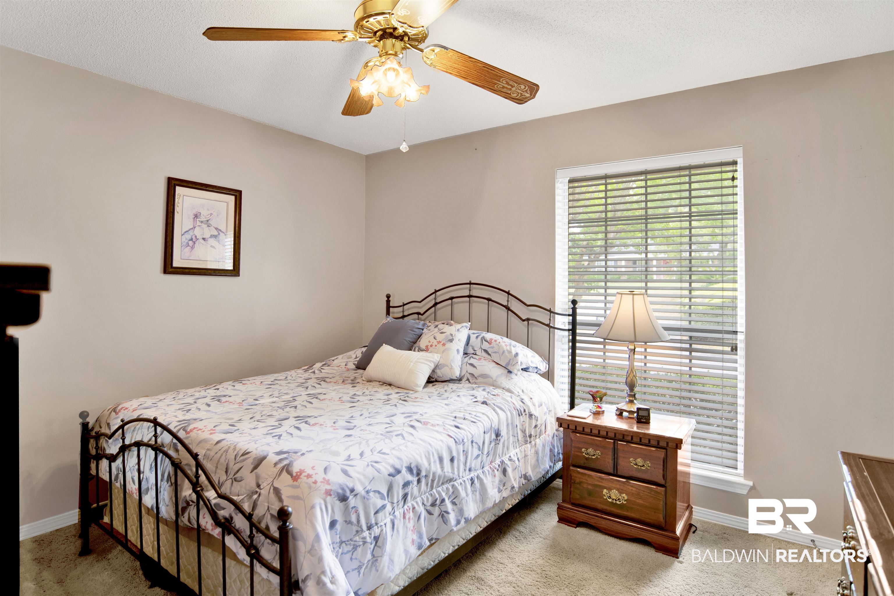 107 Virginia Circle Daphne, AL 36526 - Photo 24 of 47 Bedroom featuring light-toned walls, a window with horizontal blinds, and a ceiling fan with integrated lighting