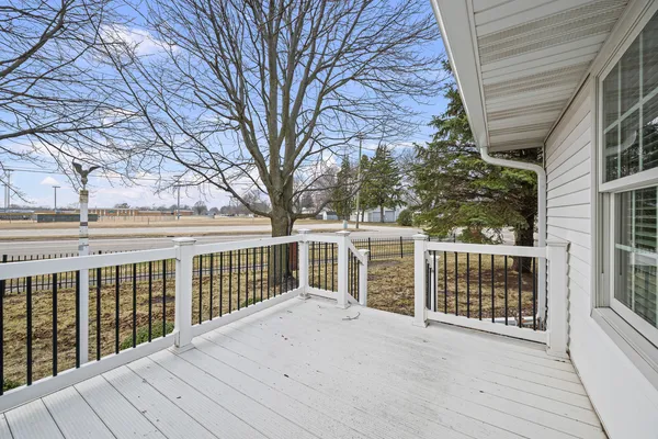 a view of a balcony with a trees