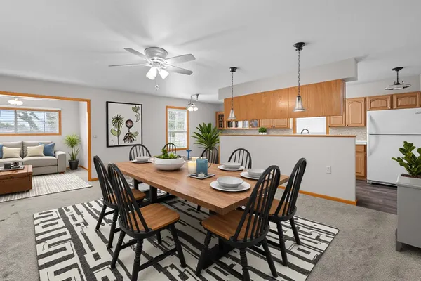 a view of a dining room with furniture
