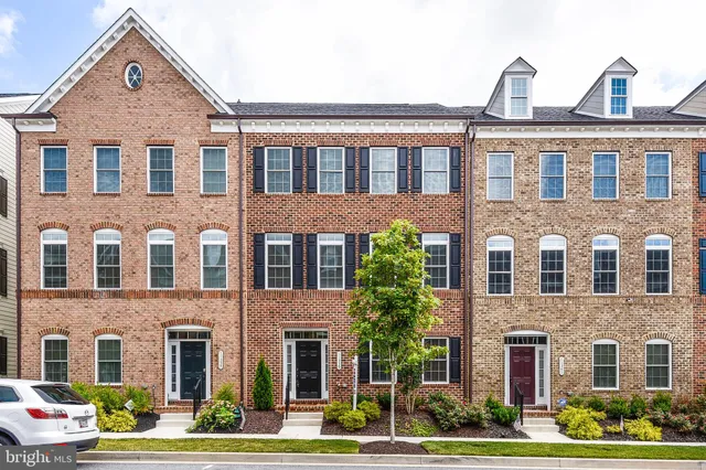 a front view of a building with yard