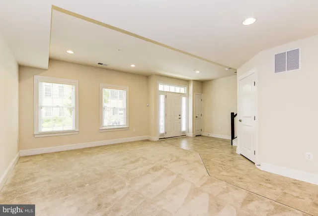 an empty room with an entryway