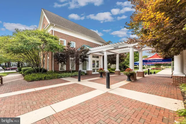 a house view with a sitting space and garden view