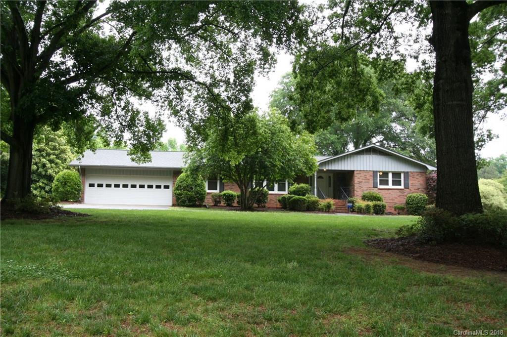 265 State Rd S-29-804 Indian Land, SC 29707 - Photo 1 of 25 a view of a big house with a big yard and large trees