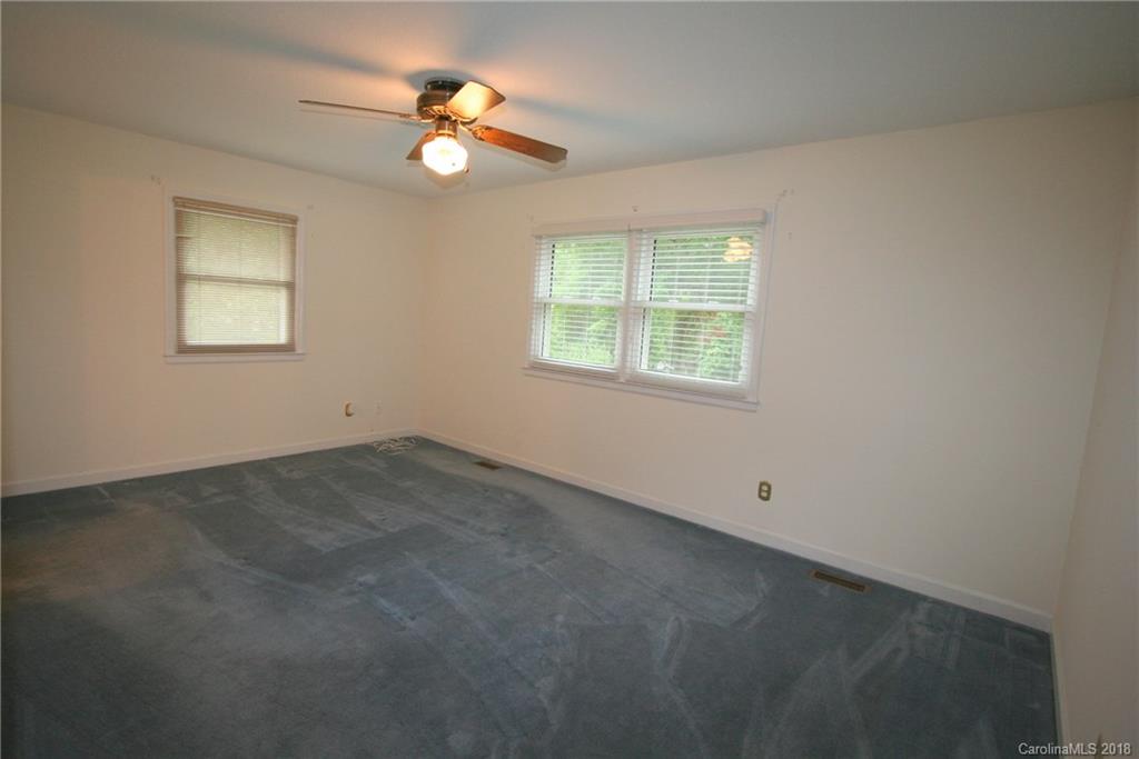 265 State Rd S-29-804 Indian Land, SC 29707 - Photo 13 of 25 an empty room with a window and a fan