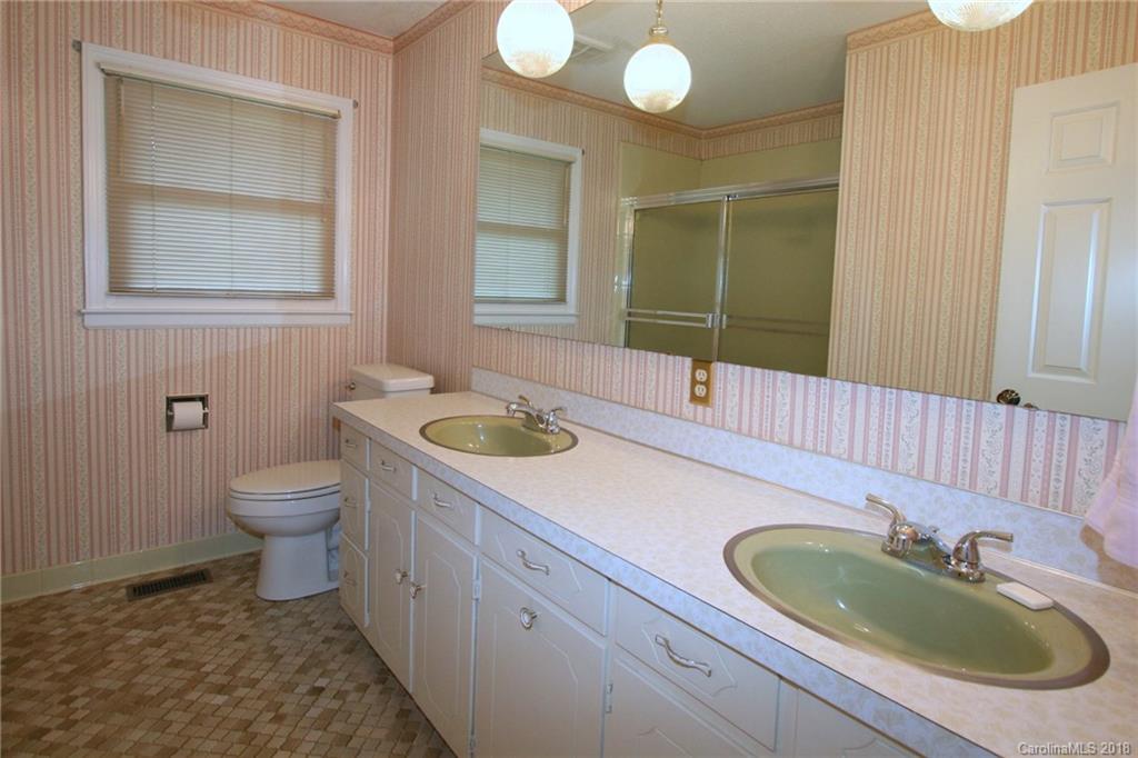 265 State Rd S-29-804 Indian Land, SC 29707 - Photo 18 of 25 a bathroom with a sink and a mirror