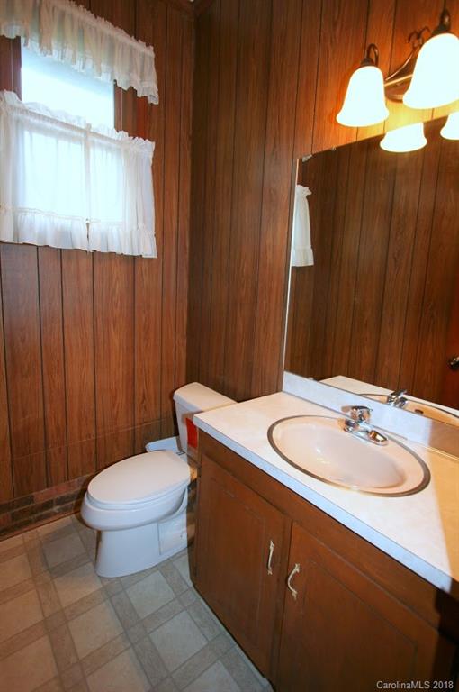 265 State Rd S-29-804 Indian Land, SC 29707 - Photo 19 of 25 a bathroom with a sink a toilet and mirror