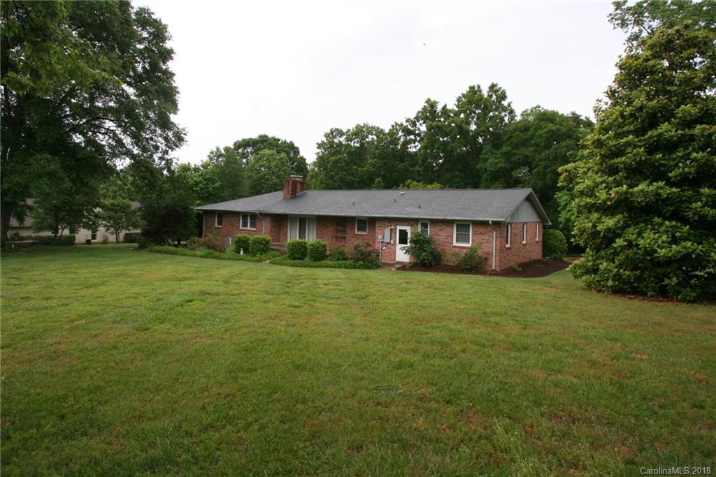 265 State Rd S-29-804 Indian Land, SC 29707 - Photo 23 of 25 a front view of a house with a garden