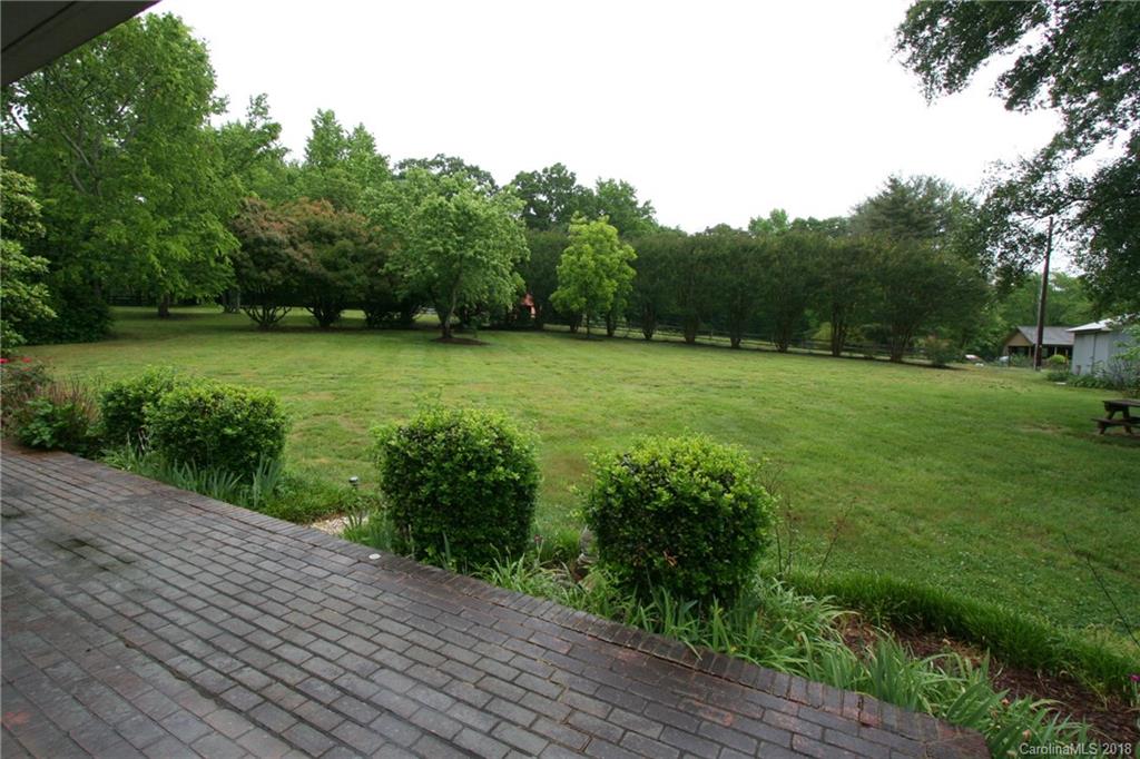 265 State Rd S-29-804 Indian Land, SC 29707 - Photo 25 of 25 a view of a yard with plants and trees