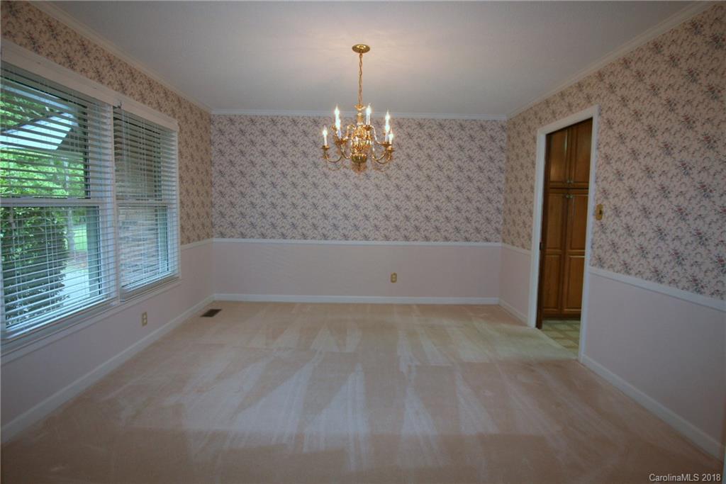 265 State Rd S-29-804 Indian Land, SC 29707 - Photo 6 of 25 a view of a livingroom with a ceiling fan and window