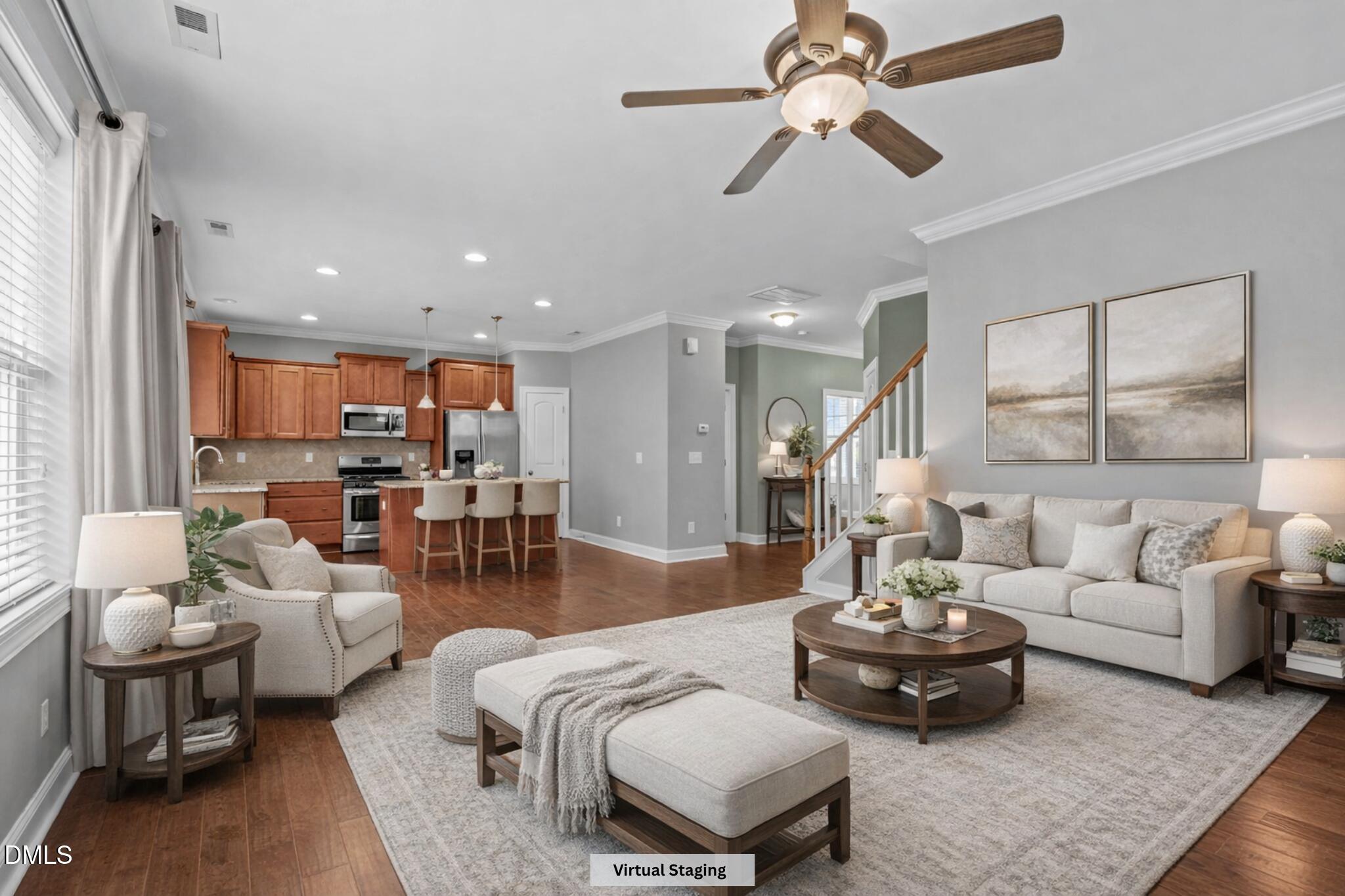 2844 Bogle Branch Court Raleigh, NC 27606 - Photo 12 of 54 a living room with furniture and a large window