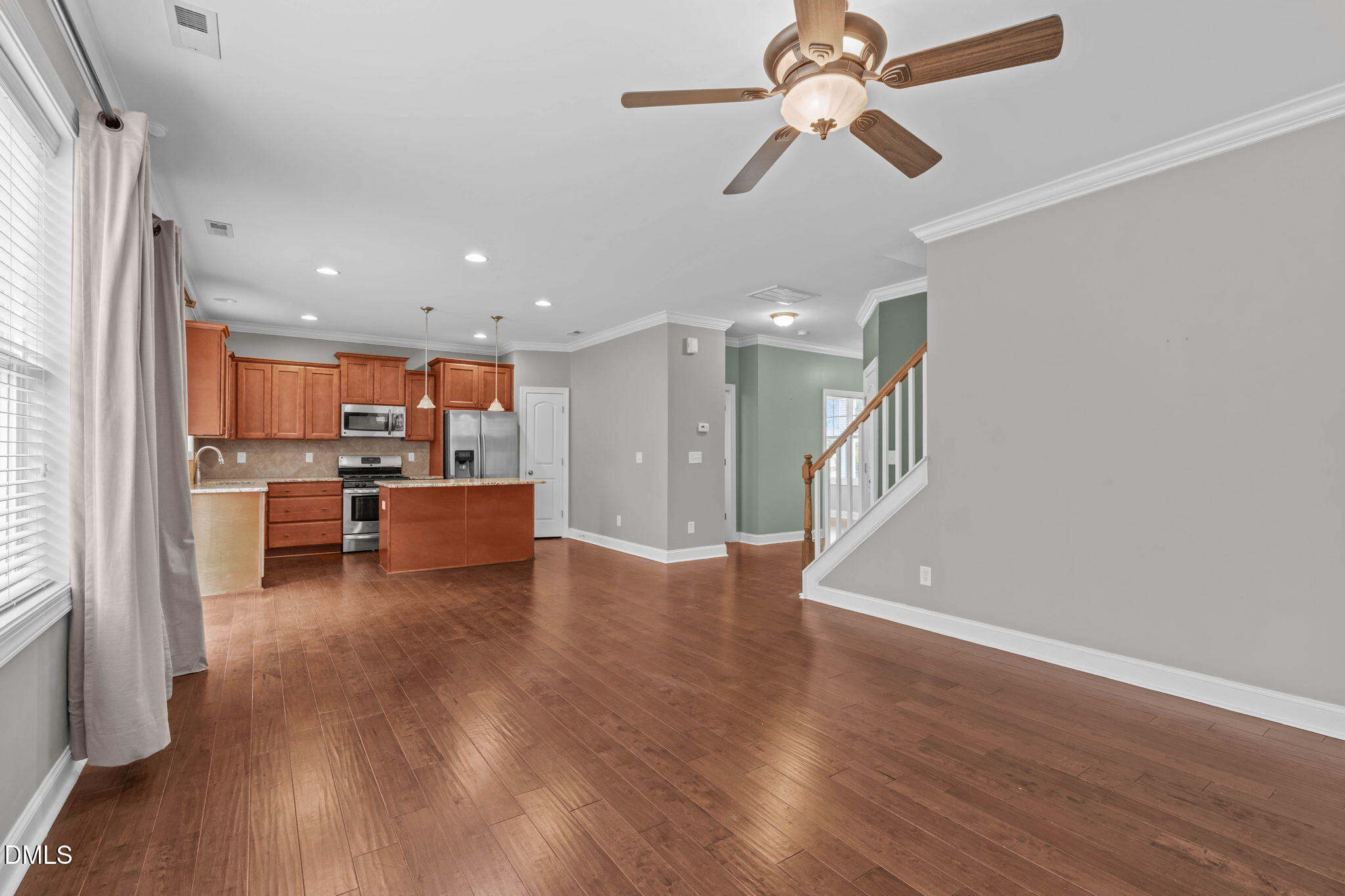 2844 Bogle Branch Court Raleigh, NC 27606 - Photo 15 of 54 a view of kitchen with refrigerator microwave and stove