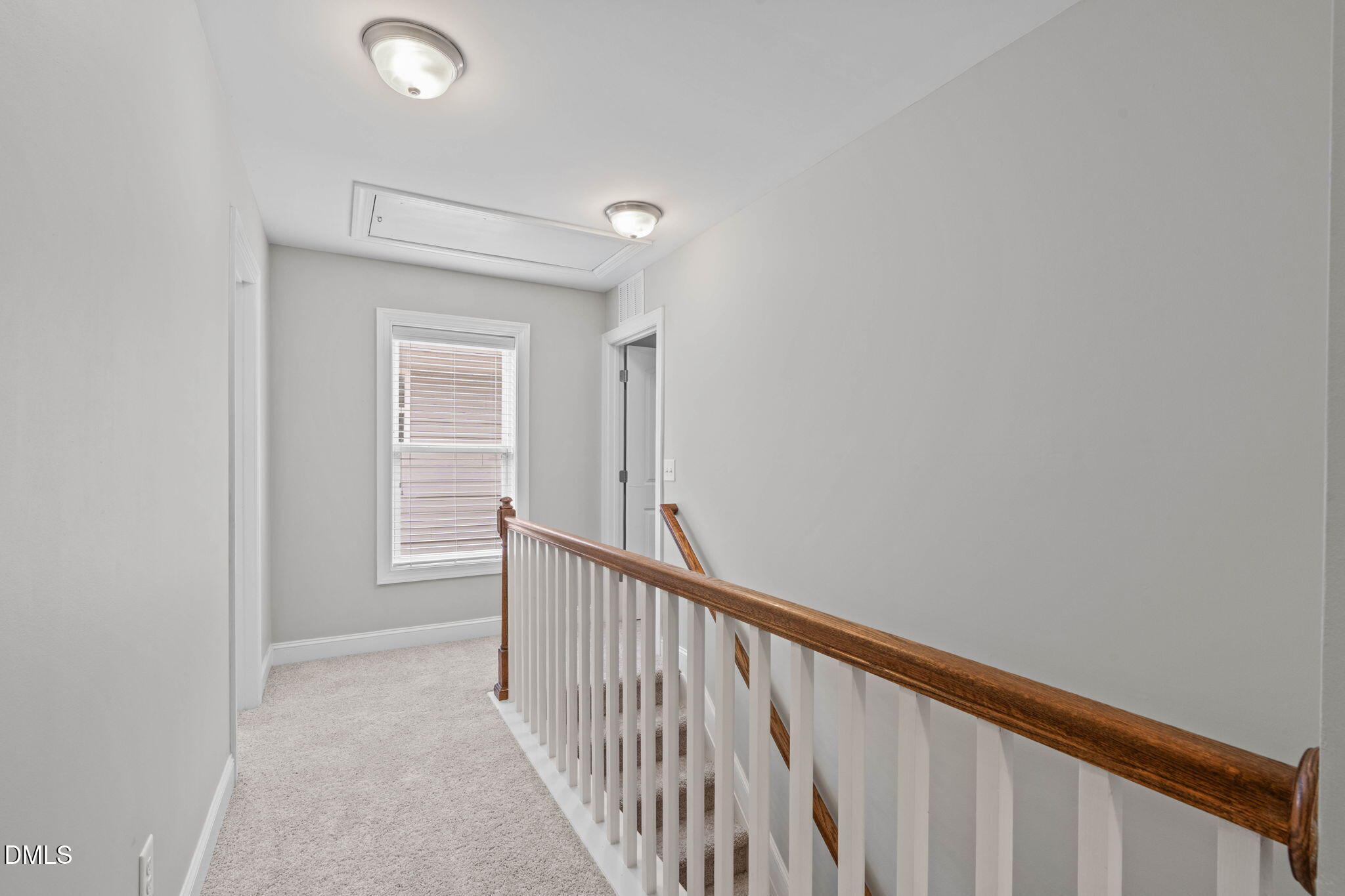 2844 Bogle Branch Court Raleigh, NC 27606 - Photo 22 of 54 a view of a hallway with wooden floor and entryway