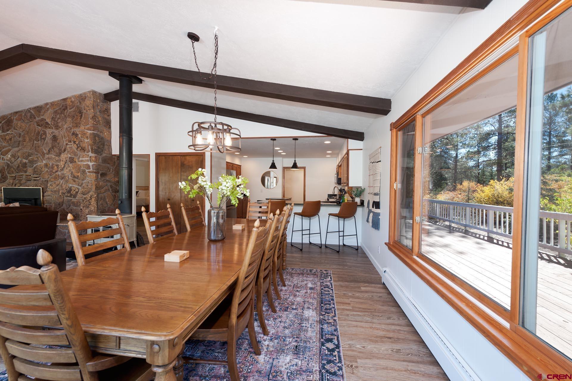 19 Newland Circle Durango, CO 81301 - Photo 16 of 44 a dining room with furniture and window
