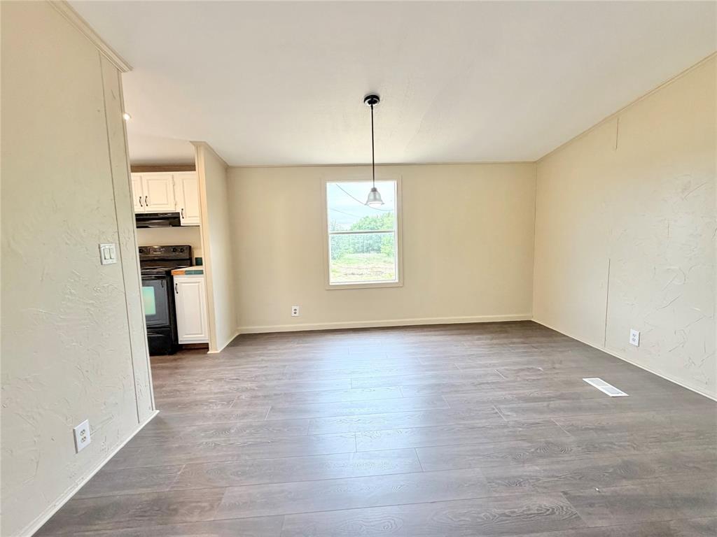 9721 Limestone Joshua, TX 76058 - Photo 11 of 36 an empty room with windows and closet