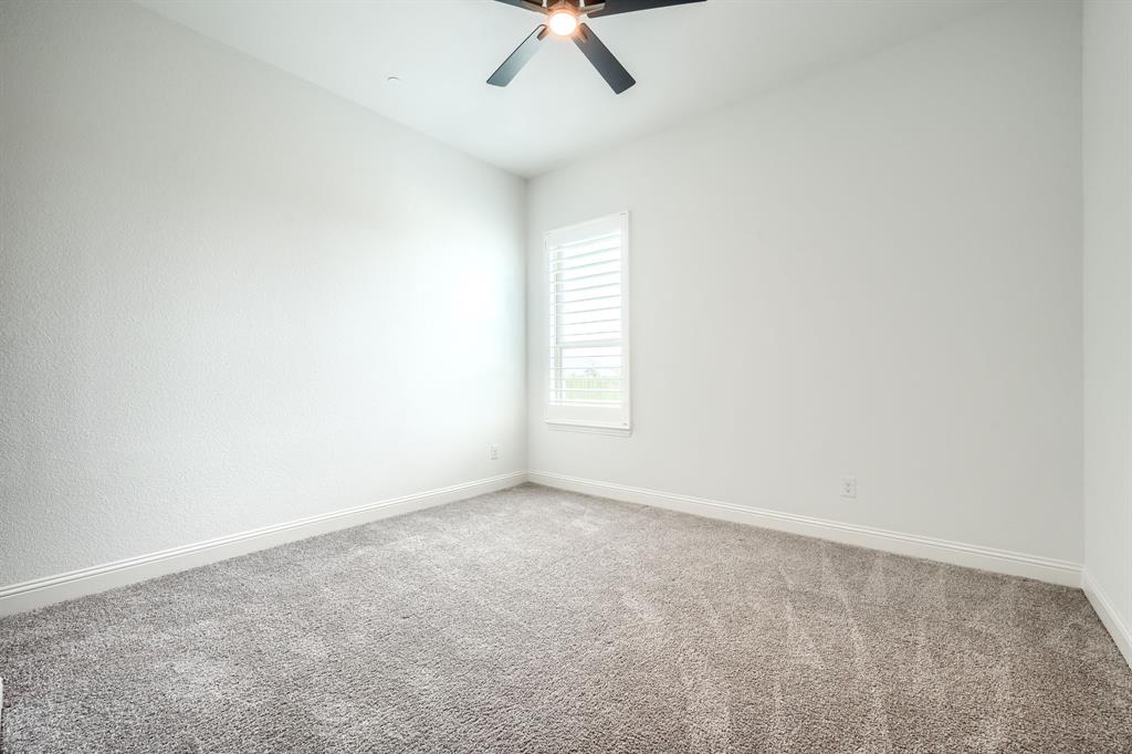 462 Infinito Drive Sunnyvale, TX 75182 - Photo 31 of 37 Unfurnished room with carpet flooring and a ceiling fan