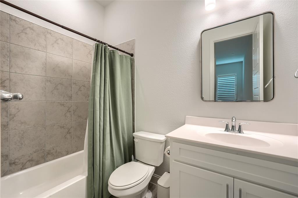 462 Infinito Drive Sunnyvale, TX 75182 - Photo 32 of 37 Full bath featuring vanity, a textured wall, and shower / bath combo