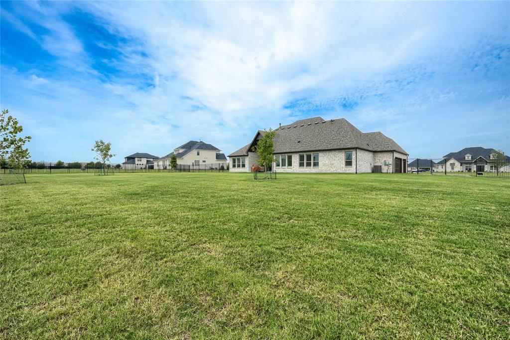 462 Infinito Drive Sunnyvale, TX 75182 - Photo 36 of 37 Back of property featuring brick siding
