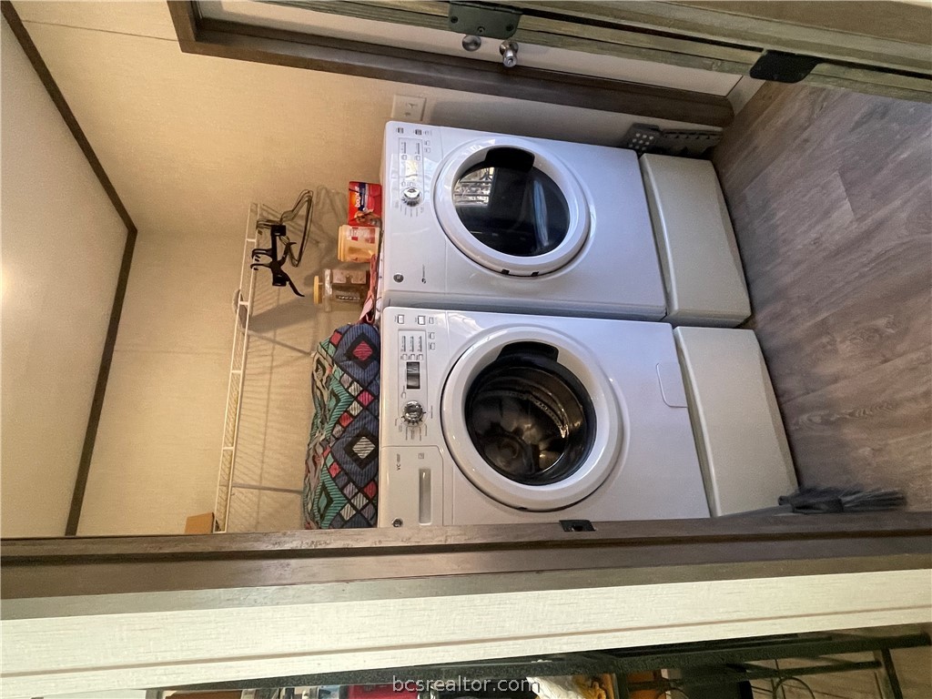 11320 Old Hearne Road Bryan, TX 77807 - Photo 25 of 26 a utility room with dryer and washer