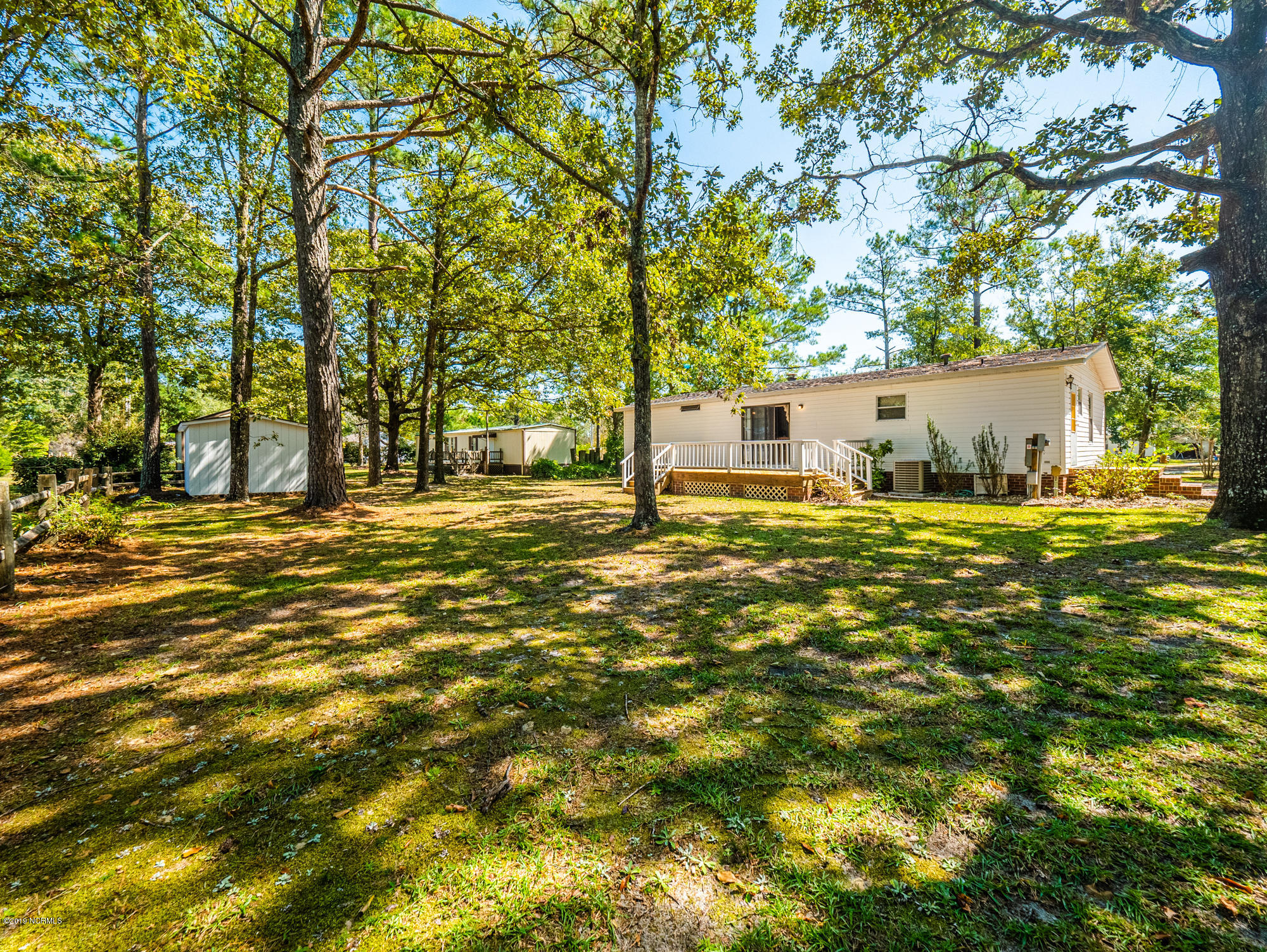 211 Doe Ridge Road Hampstead, NC 28443 - Photo 22 of 27 Large shaded back yard